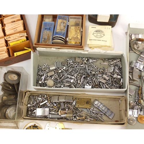 483A - Collecton of Antique and later watch parts including crystals, movements and straps