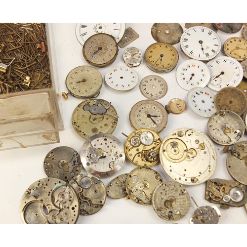 483A - Collecton of Antique and later watch parts including crystals, movements and straps