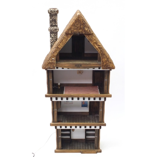 724 - Elizabethan design doll's house, 109cm H x 50cm W x 27cm D