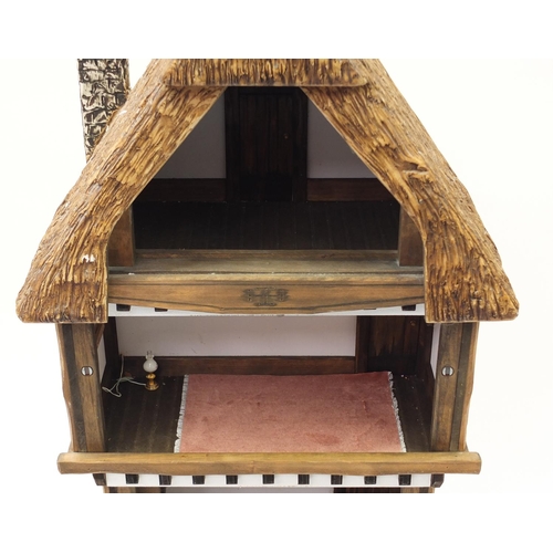 724 - Elizabethan design doll's house, 109cm H x 50cm W x 27cm D