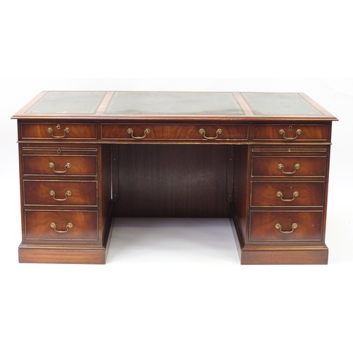 1594 - Mahogany twin pedestal desk with brushing slides and nine drawers, 75cm H x 157cm W x 87.5cm D