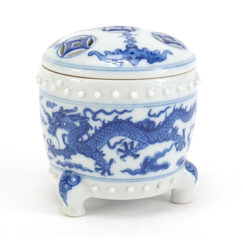 389 - Chinese blue and white porcelain tripod incense burner with pierced lid, hand painted with bats, dra... 