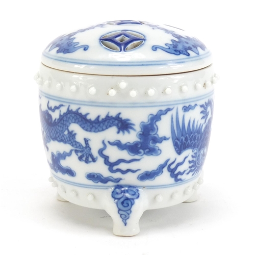 389 - Chinese blue and white porcelain tripod incense burner with pierced lid, hand painted with bats, dra... 