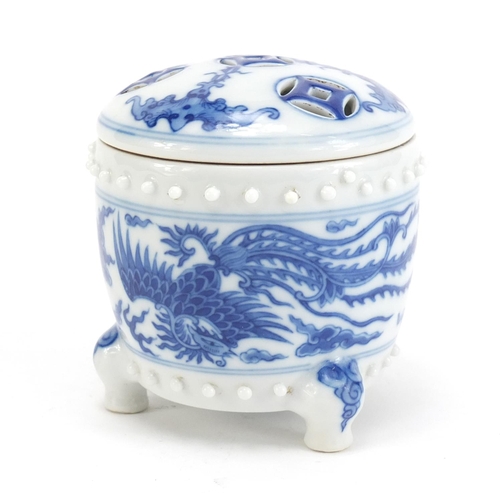 389 - Chinese blue and white porcelain tripod incense burner with pierced lid, hand painted with bats, dra... 