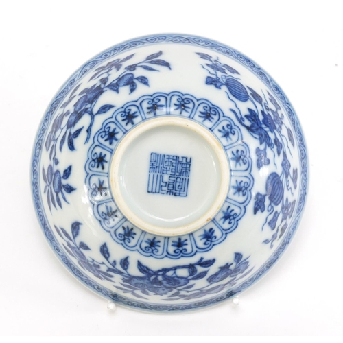 486 - Chinese blue and white porcelain bowl hand painted with fruits and flowers, six figure Qianlong char... 