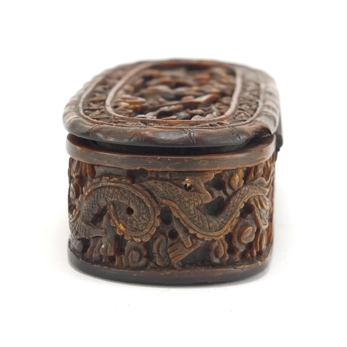 634 - Chinese Canton tortoiseshell snuff box having a hinged lid and inset silver cartouche, carved with d... 