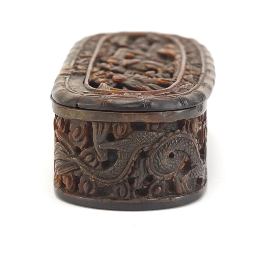 634 - Chinese Canton tortoiseshell snuff box having a hinged lid and inset silver cartouche, carved with d... 