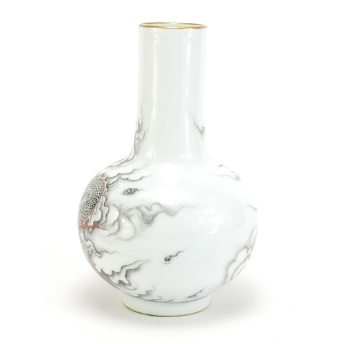 60 - Chinese porcelain vase hand painted with a dragon chasing a flaming pearl amongst clouds, six figure... 