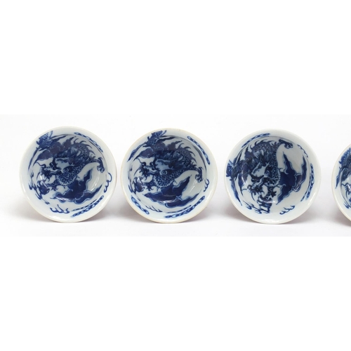 739 - Set of six Chinese porcelain stem cups decorated with dragons amongst clouds, each 8cm high