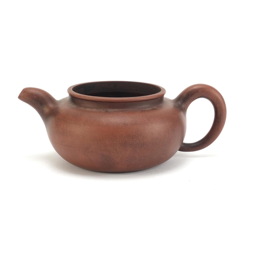 491 - Chinese yixing terracotta teapot, impressed character marks to the base, 21cm in length