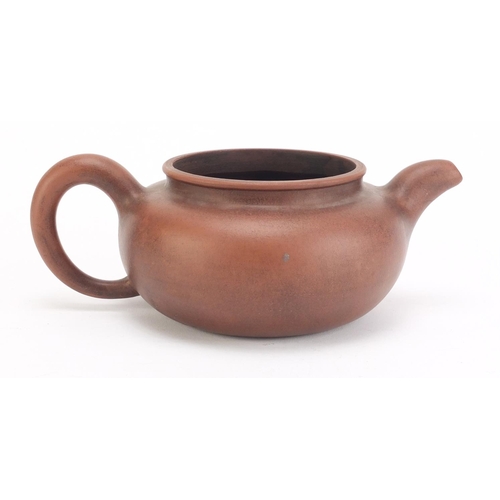 491 - Chinese yixing terracotta teapot, impressed character marks to the base, 21cm in length