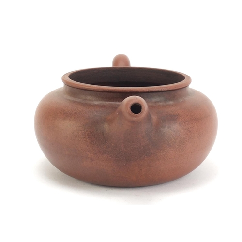 491 - Chinese yixing terracotta teapot, impressed character marks to the base, 21cm in length