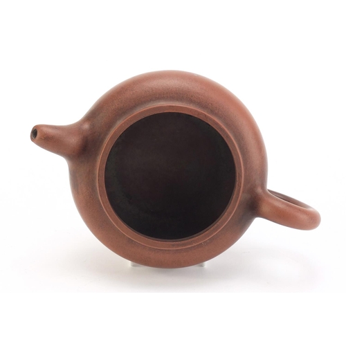 491 - Chinese yixing terracotta teapot, impressed character marks to the base, 21cm in length