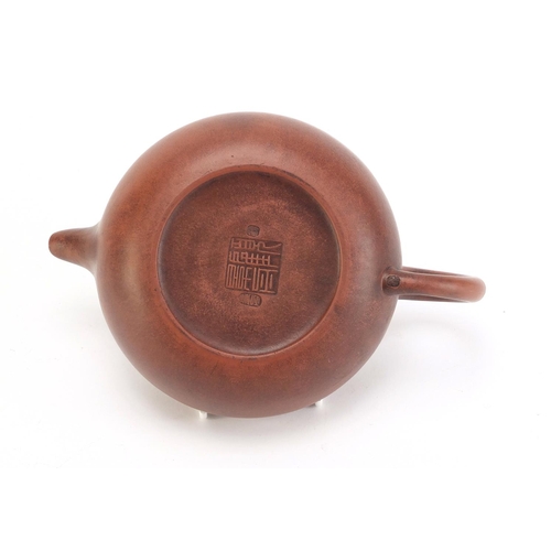 491 - Chinese yixing terracotta teapot, impressed character marks to the base, 21cm in length