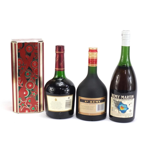 72 - Three bottles of cognac/brandy comprising Vintage Remy Martin VSOP, Courvoisier with box and Napoleo... 