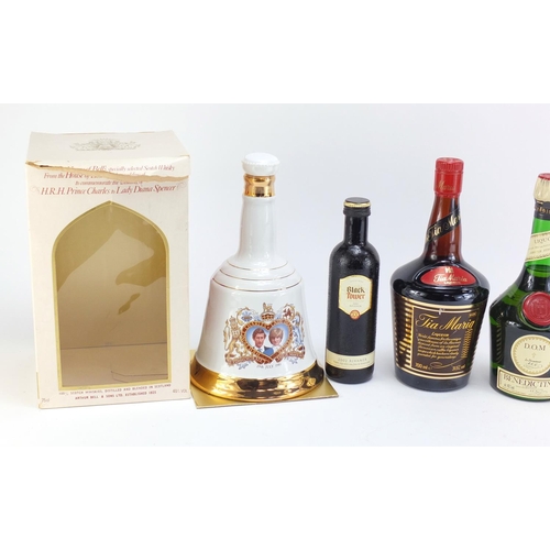 864 - Six bottles of alcohol including 1L Famous Grouse whiskey, vintage 1L Bacardi and Bells Prince Charl... 