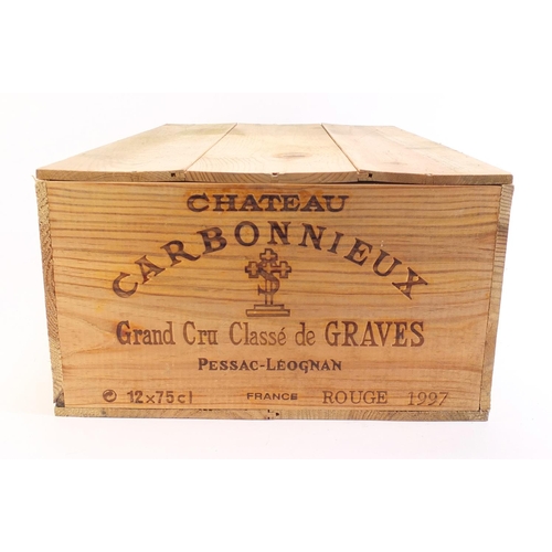 795 - Twelve bottles of 1997 Chateau Carbonnieux Pessac-Leognan 'Grand Cru Classe red wine housed in a sea... 