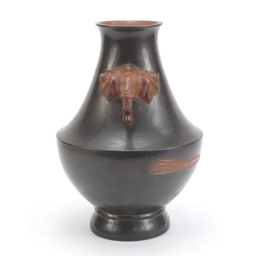 128 - Chinese Yixing teracotta vase with elephant head handles, incised with a landscape, 33cm high