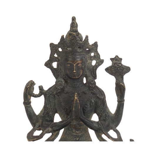 233 - Chino-Tibetan patinated bronze figure of Buddha, 15cm high