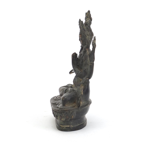 233 - Chino-Tibetan patinated bronze figure of Buddha, 15cm high