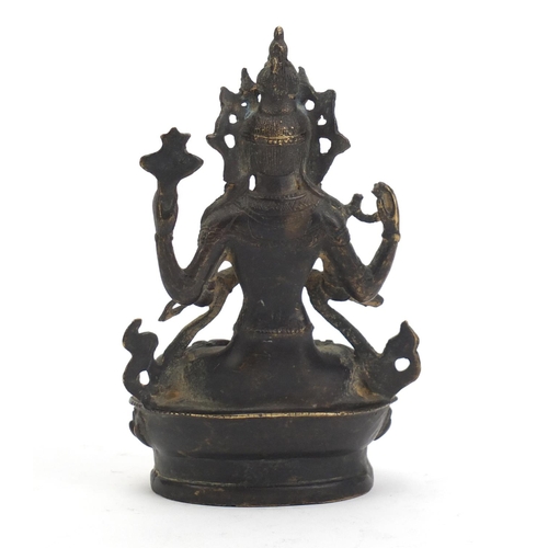 233 - Chino-Tibetan patinated bronze figure of Buddha, 15cm high