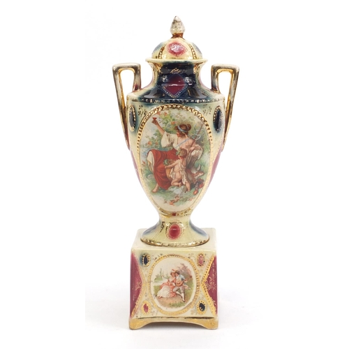 1138 - Royal Vienna twin handled vase and cover on stand, decorated with mother and child, 30.5cm high