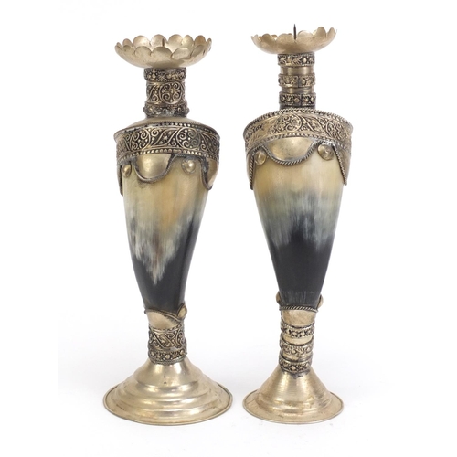 247 - Pair of horn candlesticks with white metal mounts, 22.5cm high