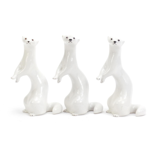 1135 - Three USSR porcelain otters, each 18cm high