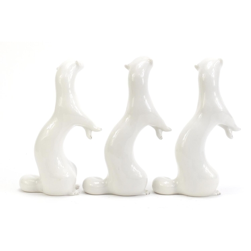 1135 - Three USSR porcelain otters, each 18cm high