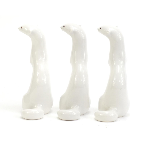 1135 - Three USSR porcelain otters, each 18cm high