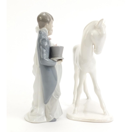 1132 - Lladro figure group of a bride and groom together with a Villeroy & Boch foal, the largest 21cm high