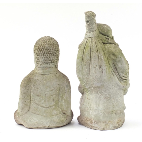 1426 - Two garden stoneware statues of Buddhas, the largest 60cm high