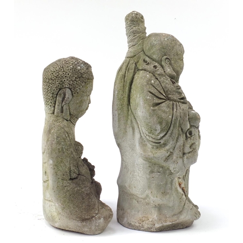 1426 - Two garden stoneware statues of Buddhas, the largest 60cm high