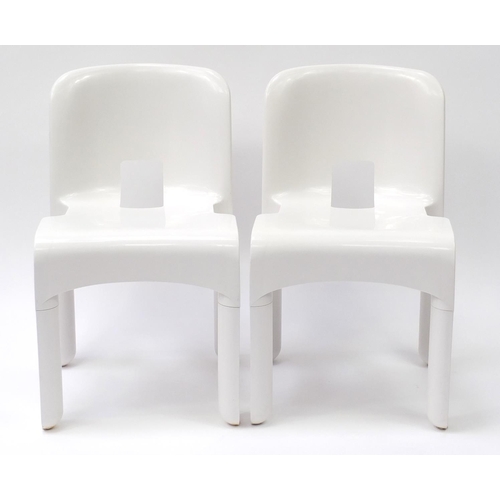 1588 - Pair of Kartell Universale chairs designed by Joe Colombo, numbered 4867, each 72cm high