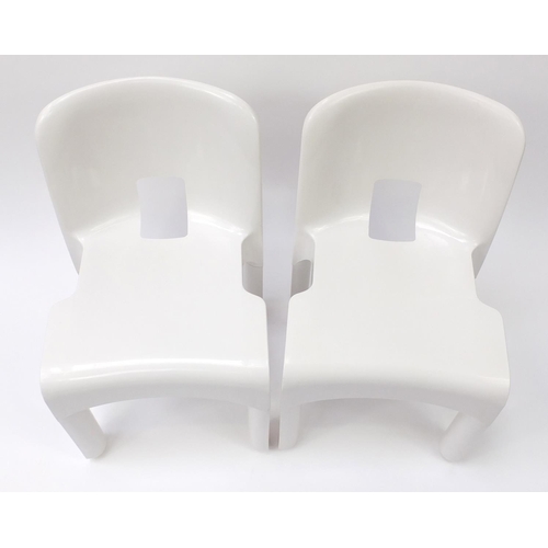 1588 - Pair of Kartell Universale chairs designed by Joe Colombo, numbered 4867, each 72cm high