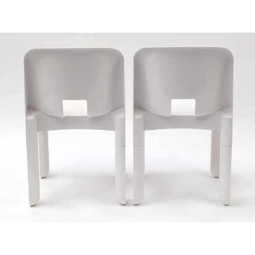 1589 - Pair of Kartell Universale chairs designed by Joe Colombo, numbered 4867, each 72cm high