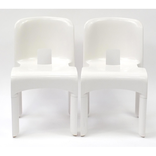 1590 - Pair of Kartell Universale chairs designed by Joe Colombo, numbered 4867, each 72cm high