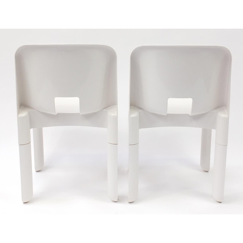 1590 - Pair of Kartell Universale chairs designed by Joe Colombo, numbered 4867, each 72cm high