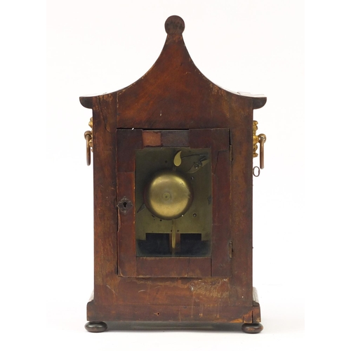 38 - Regency mahogany pagoda topped bracket clock with inset brass panel to the front, flower head design... 