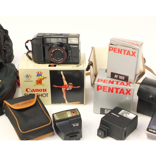 1407 - Cameras and accessories including Minolta, Nikon, Pentax, Canon and Vivitar