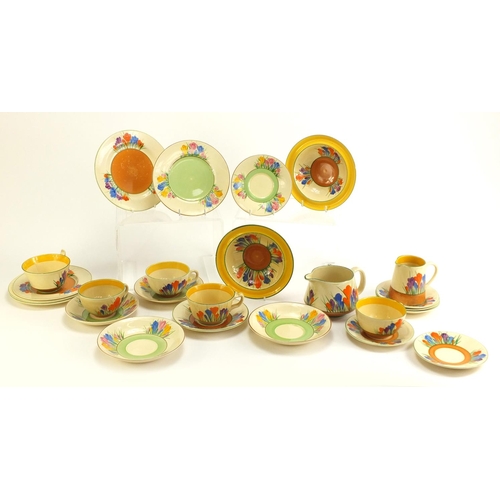 137 - Art Deco Clarice Cliff teaware hand painted in the Crocus pattern including cups, plates and milk ju... 