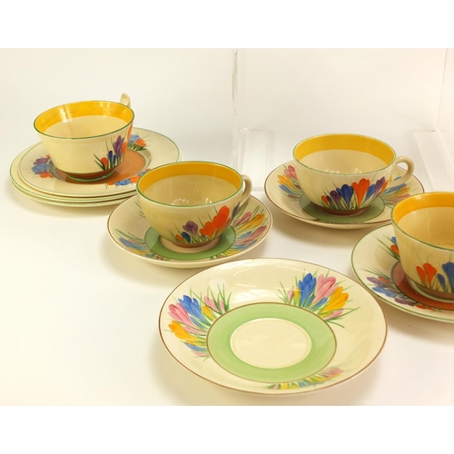 137 - Art Deco Clarice Cliff teaware hand painted in the Crocus pattern including cups, plates and milk ju... 