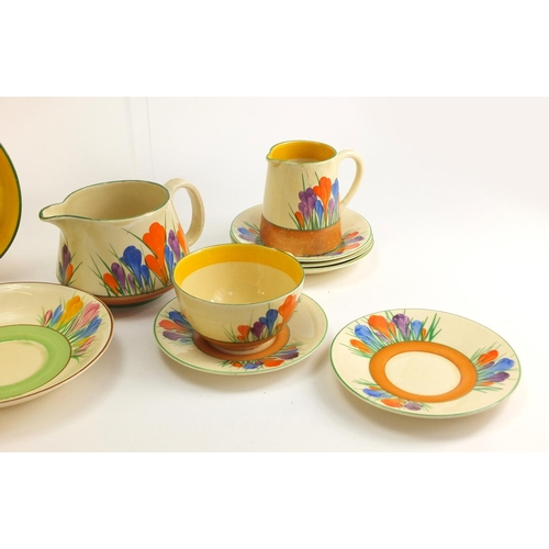 137 - Art Deco Clarice Cliff teaware hand painted in the Crocus pattern including cups, plates and milk ju... 