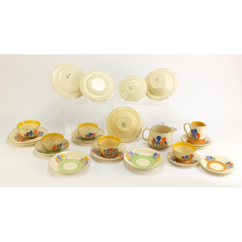 137 - Art Deco Clarice Cliff teaware hand painted in the Crocus pattern including cups, plates and milk ju... 