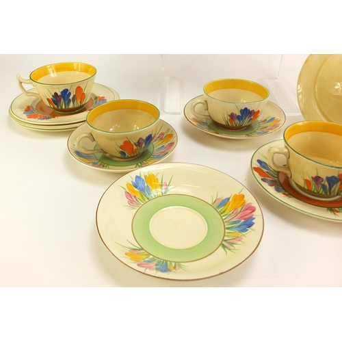 137 - Art Deco Clarice Cliff teaware hand painted in the Crocus pattern including cups, plates and milk ju... 