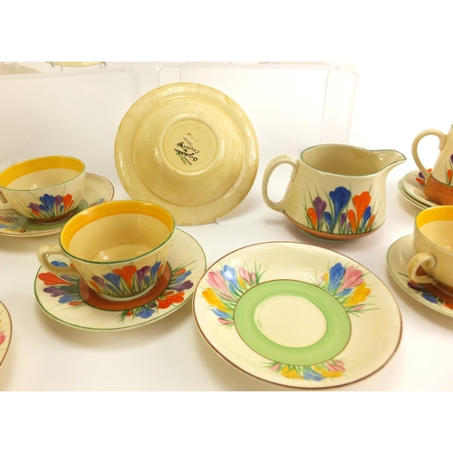 137 - Art Deco Clarice Cliff teaware hand painted in the Crocus pattern including cups, plates and milk ju... 