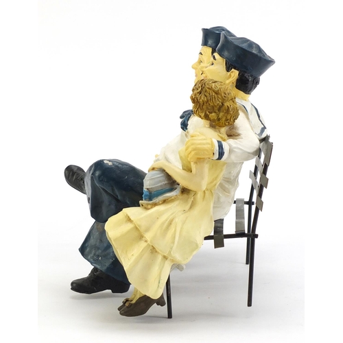 1198A - Painted model of Laurel & Hardy on a park bench, 28.5cm wide