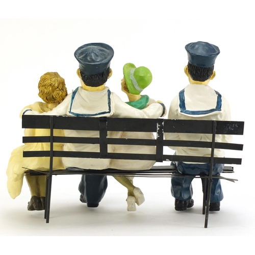 1198A - Painted model of Laurel & Hardy on a park bench, 28.5cm wide