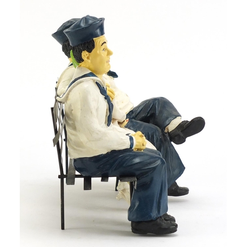 1198A - Painted model of Laurel & Hardy on a park bench, 28.5cm wide