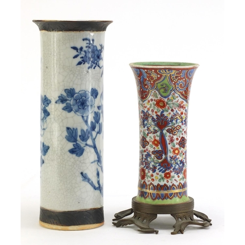 741 - Two Chinese porcelain vases hand painted with flowers, one with bronzed base, character marks to the... 